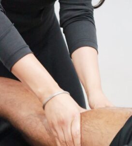 Registered massage therapist providing treatment at a Brampton clinic